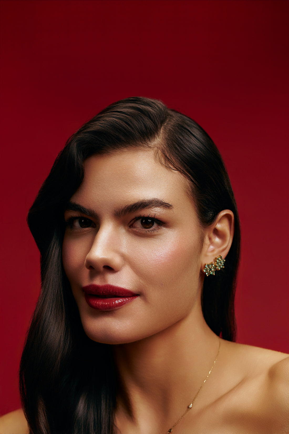 Brinco flor de esmeralda